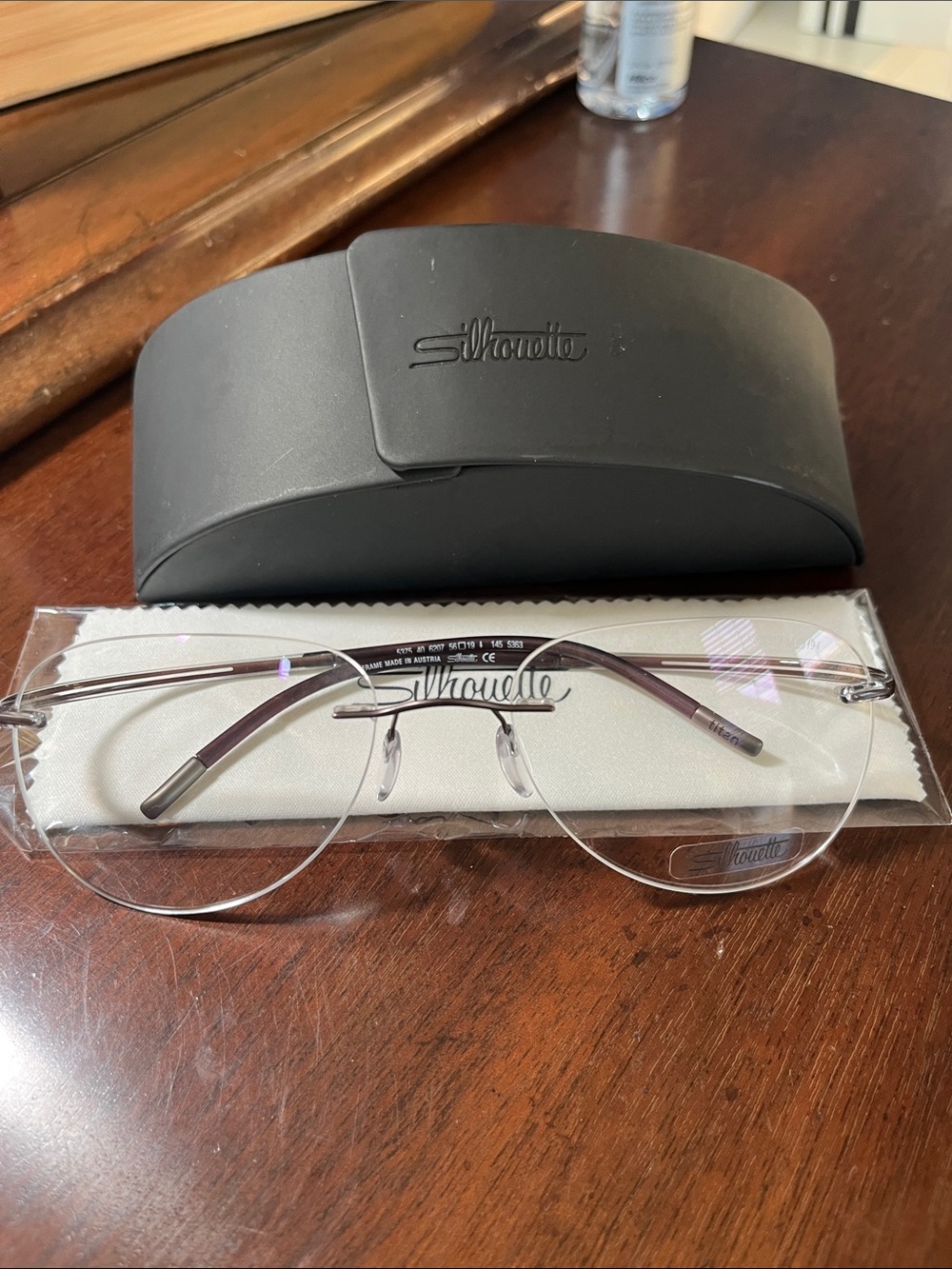 Silhouette titanium 5375 rimless aviator with brown and clear wrap minimal frame